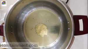 Ginger-garlic paste with oil in makhani mutton karahi