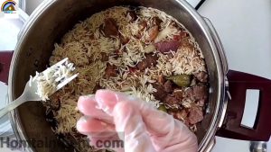 Half-cooked-rice-before-steaming for mutton yakhni pulao