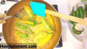Frying of stuffed green chillies2